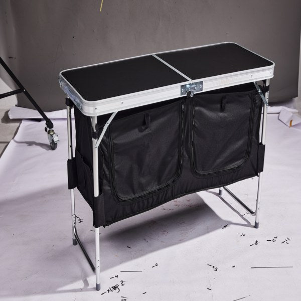 4ft 47cm Wide Black Outdoor Folding Table, Aluminum Alloy Rectangular, Two-fold Tabletop With Black Fabric Cupboard, 3 Height Adjustments.